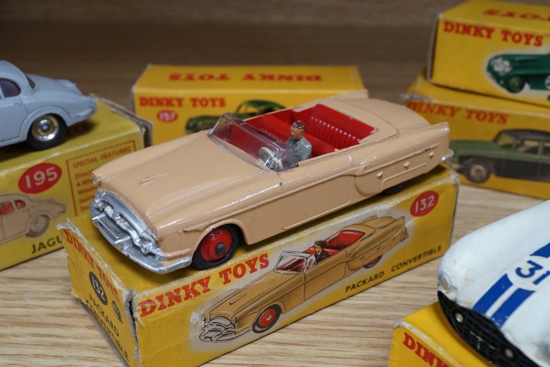 Six boxed Dinky Toys cars; Cunningham C-5R (133), Jaguar 3.4 saloon (195) in grey, Packard convertible (132) in fawn, Jaguar XK120 (157) in dark red (in a reproduction box), Humber Hawk (165) in two-tone green and black,
